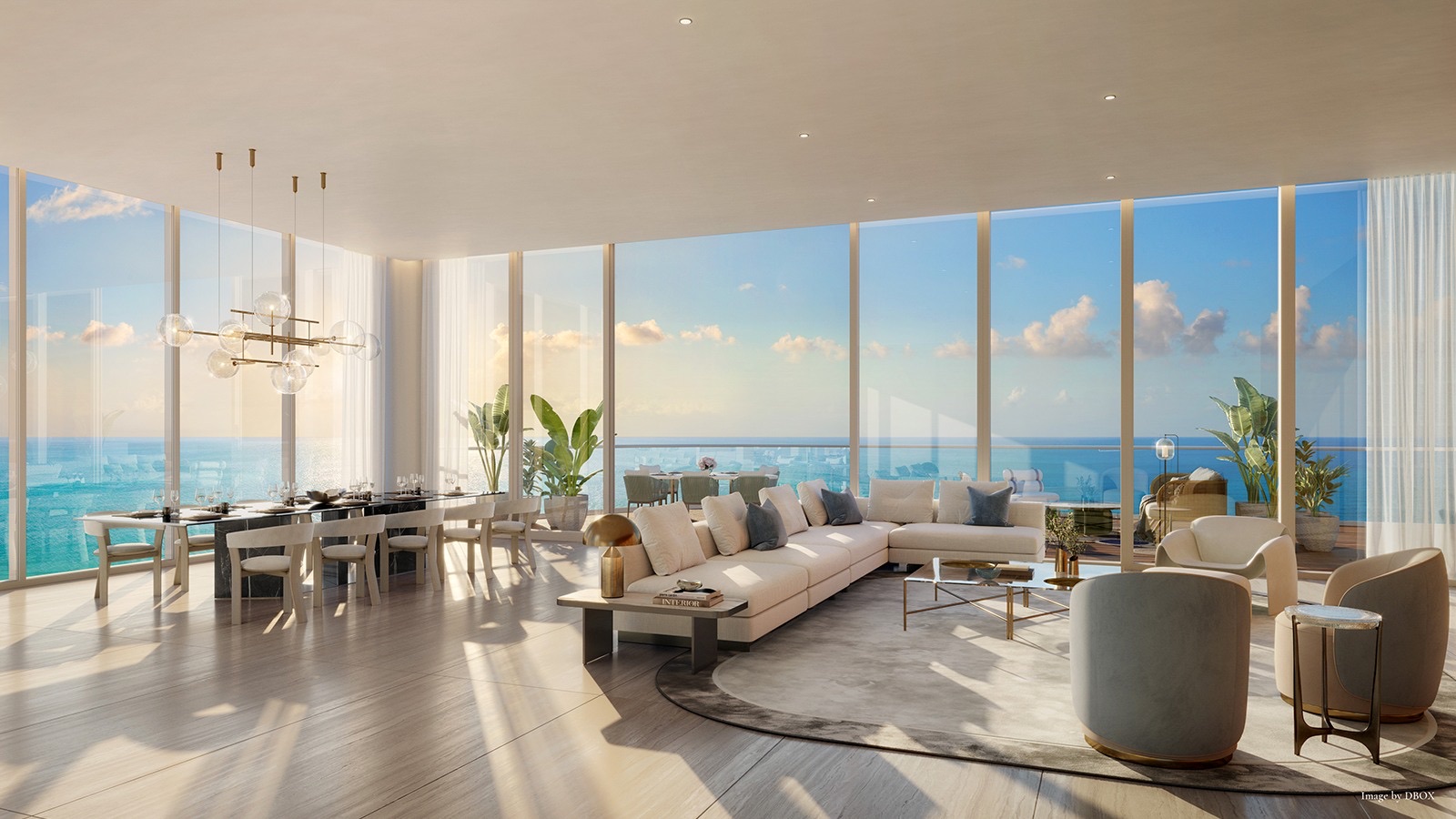 Open living and dining room with ocean views